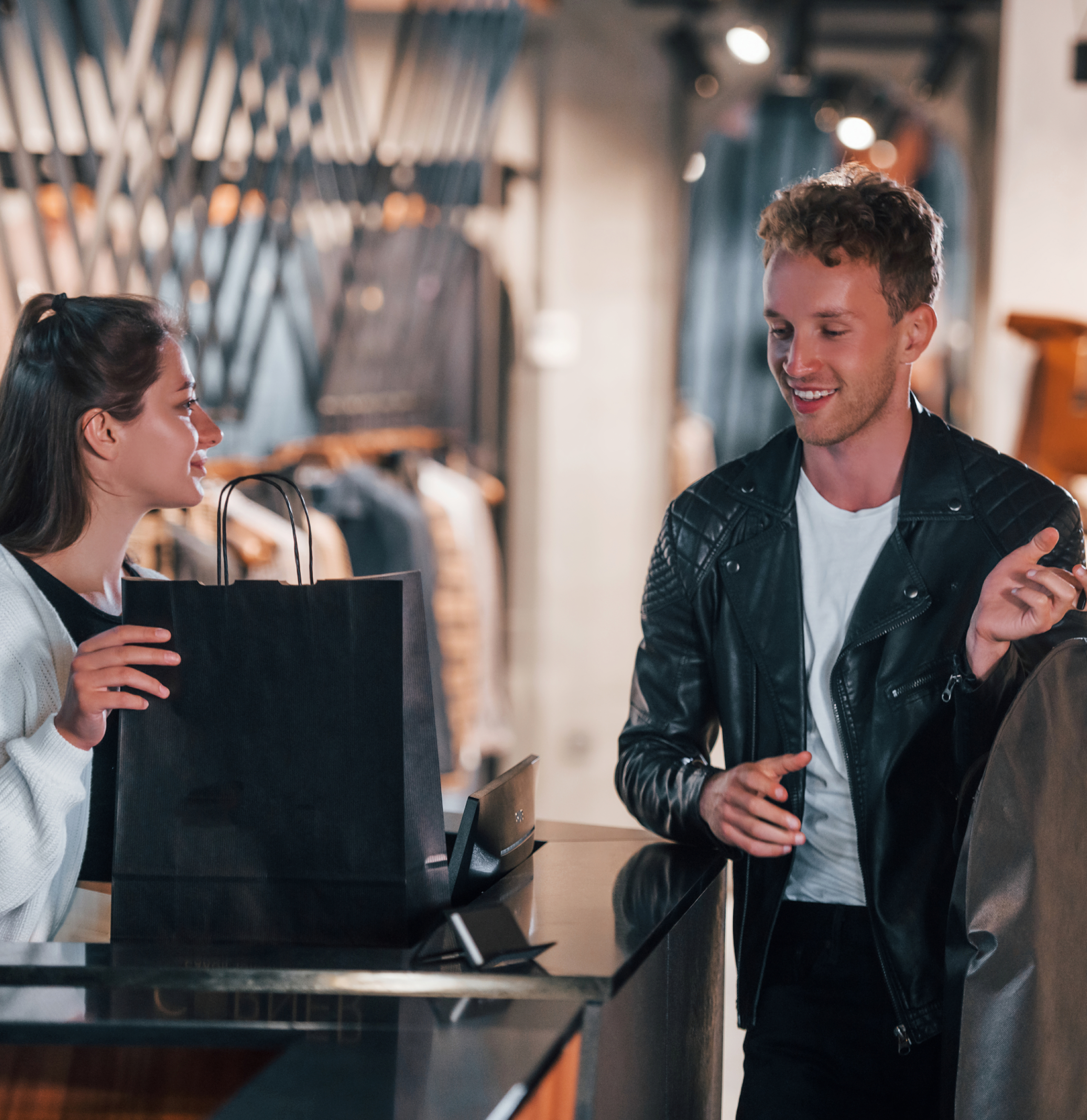 man checking out at a retail shop