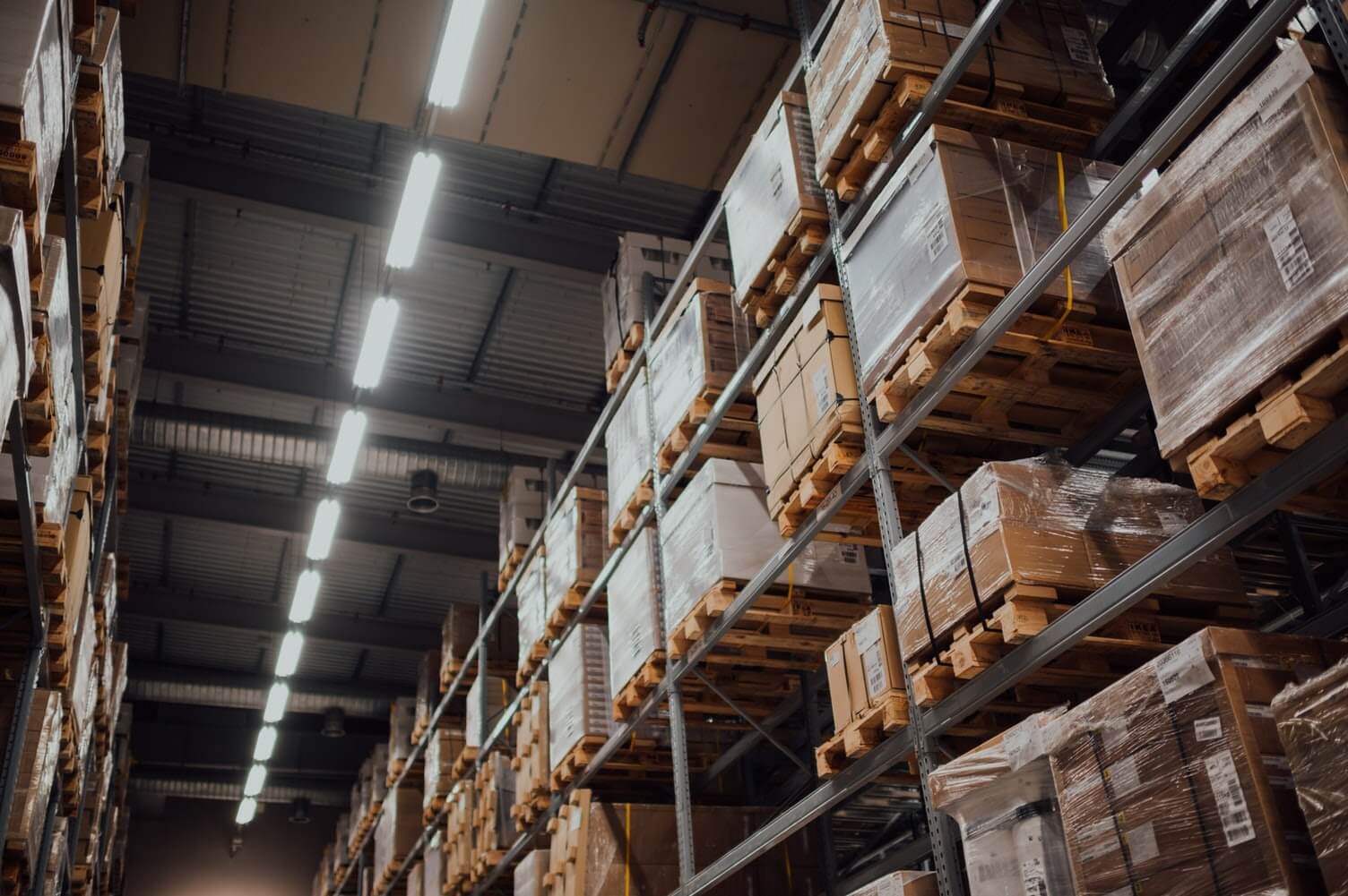 A photo of inventory boxes within a warehouse.
